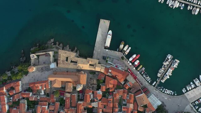 Panoramic view of the old town of Krk in Croatia, cathedral tower and seascape in background