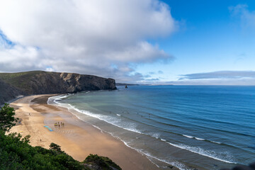 Beautiful beach on the west coast of Algarve. Arrifana beach, in Aljezur, Costa Vicentina. Surfing in Portugal.