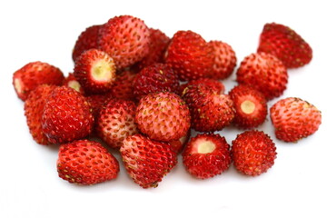 Wild strawberry isolated on white background closeup
