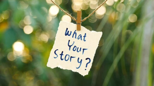 What's your story? - Torn note paper with the text What's your story hanging and swinging on a rope, nature bokeh sunset in the background