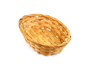 Obraz premium Empty wicker basket on a white background.