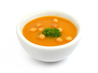 Bowl of squash soup isolated on a white background. pumpkin soup