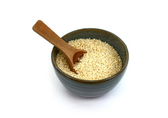 Organic integral sesame seeds isolated on white background