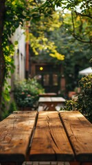Rustic wooden table set in a lush, verdant outdoor garden bathed in warm golden light, offering a peaceful and inviting atmosphere for relaxation and dining.