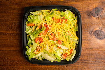 Salad with cheddar cheese and tomatoes