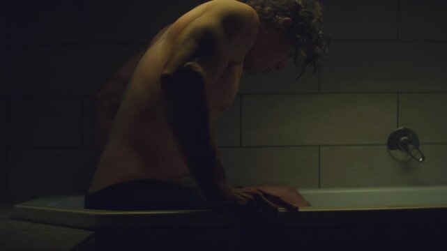 Athlete taking an ice bath