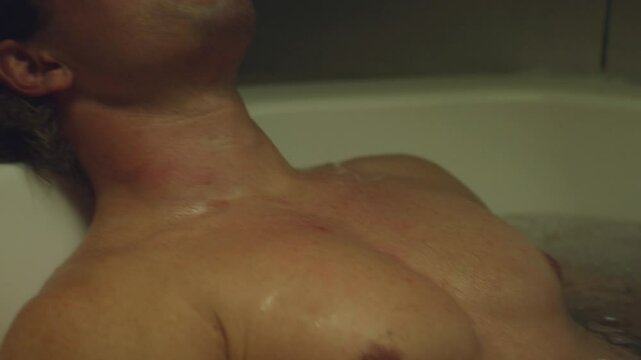 Chest of an Athlete enjoying the ice bath