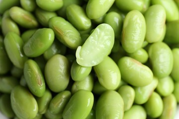 Fresh edamame soybeans as background, above view