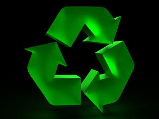 Green recycle symbol glowing on black background representing environmental awareness