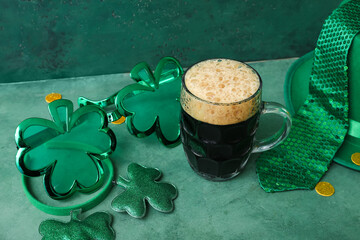 Mug of dark beer with leprechaun hat, tie and plastic eyeglasses for St. Patrick's Day celebration...