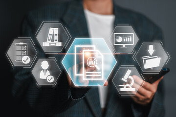 Businessman Analyzing Data and Documents with Futuristic Digital Interface for Case Study Concept