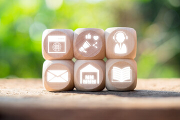 Omni Channel Concept with Wooden Blocks Representing Various Communication and Marketing Channels