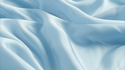 Obraz premium Light blue silk fabric with gentle waves and soft folds