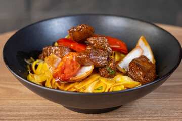 Peruvian fettuccini whit grilled meat