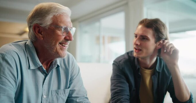 Senior man, lounge and talk in home with family, conversation and happy bonding with laugh. University student, sofa and grandfather together with smile and care from communication, love and support