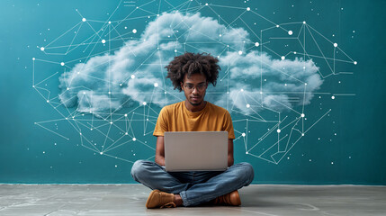 aerial view of a man sitting cross-legged and working at a laptop, with an abstract cloud and network lines in the background