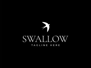 Obraz premium swallow logo vector illustration. flying bird logo template