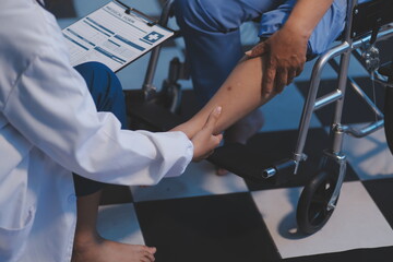 Asian young professional successful friendly female nurse in blue hospital uniform helping...