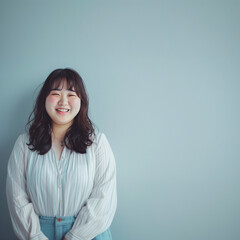 Obraz premium ぽっちゃりとした体型のアジア人女性