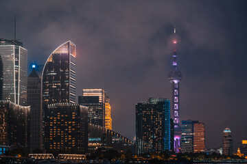 Urban skyscrapers in Shanghai at night; 