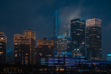 Obraz premium Urban skyscrapers in Shanghai at night; 