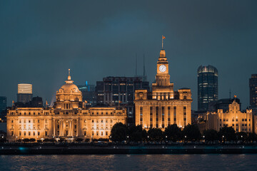 Obraz premium Urban skyscrapers in Shanghai at night; 