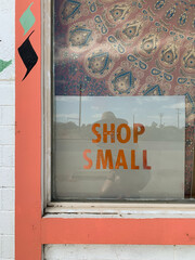 Shop Small Sign In Store Window With A Desert Aesthetic