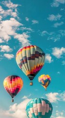 Fototapeta premium A hot air balloon race, colorful balloons against the sky