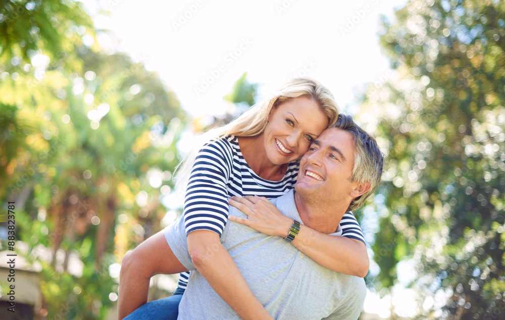 Canvas Prints Hug, piggyback and smile with couple in park together for anniversary, bonding or romance. Adventure, love for vitamin D with mature man and woman outdoor in nature for summer holiday or vacation