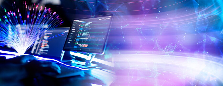 Program code on a computer monitor with fiber optic background. Internet and technology concept. Software application development