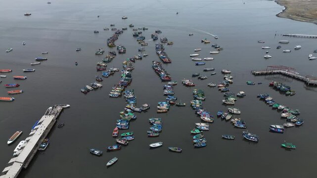4k 30fps paracas beach with colors boats in peru drone shoot