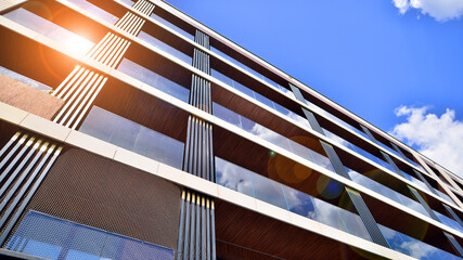 European residential architecture. Elements of modern architecture in apartment building. The facade of the building is made modern panels of different shades. 