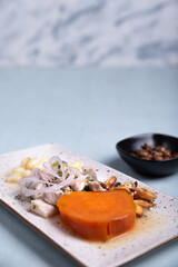 Close-up, traditional Peruvian dish called Ceviche.