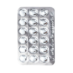 Blister pack of tablets isolated on a white background, ideal for medical and pharmaceutical themes in stock photography.