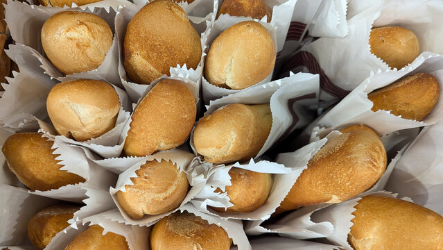 Top down view of freshly baked baguettes bread at local supermarket