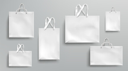 Paper shopping bags mockup, white packages set