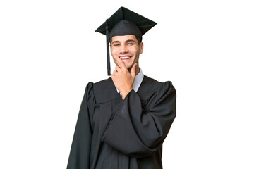 Young university graduate caucasian man over isolated background smiling