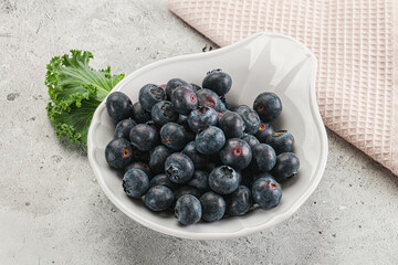 Sweet ripe blueberry on the bowl