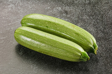 Raw green ripe zucchini vegetable