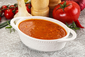 Hot tomato soup with diced chicken