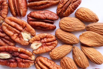 pile of almonds and pecan nuts