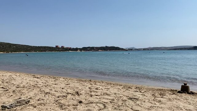 Lovely beach in Paros Greece. 4k footage of calm sea waves. blue sky