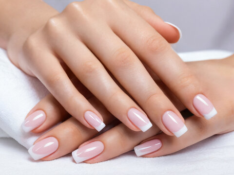 Closeup to woman hands with manicure. gel polish manicure on square nails