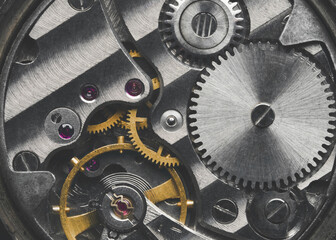 Ancient tiny metal clockwork close up background