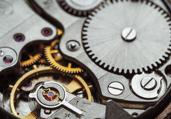 Clockwork old mechanical pocket watch. Macro shot.