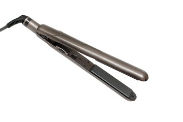 Hair straightener. Concept of hair care, hairstyle, beauty salon, hairdresser