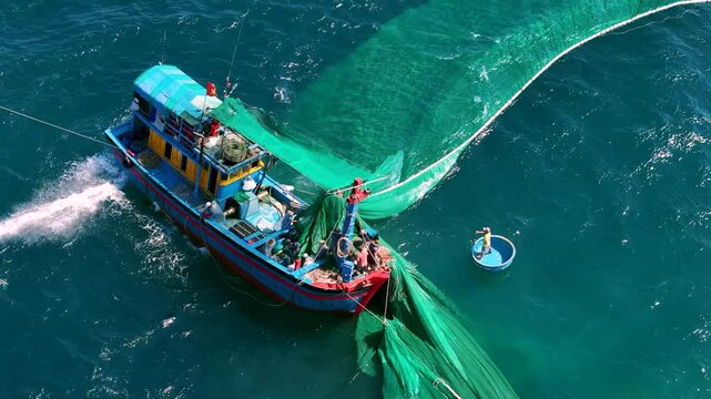 Aerial view of traditional wooden boat and fishermen are fishing anchovies in Yen Island, Phu Yen province, Vietnam. Travel and landscape concept