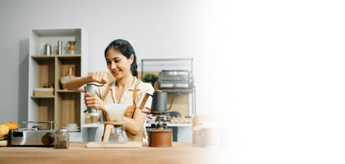 Asian barista brewing fresh espresso. Enjoy a cozy, trendy cafe experience with high quality beans in home or cafe