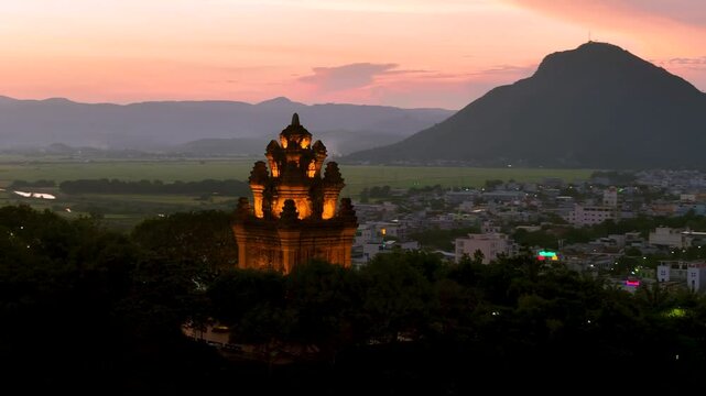 Aerial view of Nhan temple, tower is an artistic architectural work of Champa people in Tuy Hoa city, Phu Yen province, Vietnam. Sunset view. Travel and landscape concept