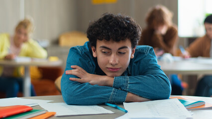 Tired sleepy napping exhausted fatigued overworked overload pupil teen boy teenager sleep student guy teenage generation man male schoolboy health problem boring class lesson sleeping at table school - Powered by Adobe